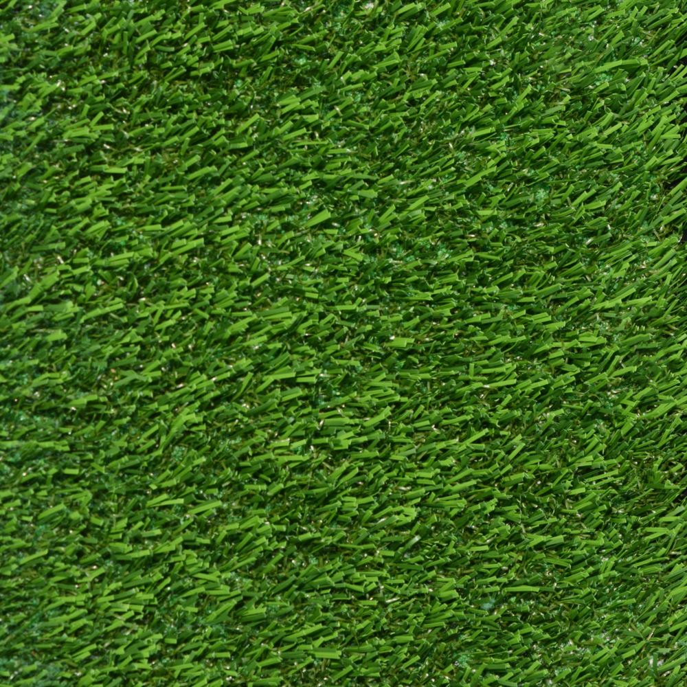 Close up of artificial turf for pets featuring green grass strands